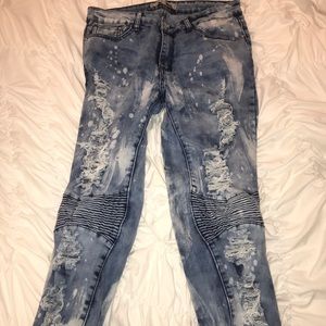 Medium wash, bleach designed jeans
